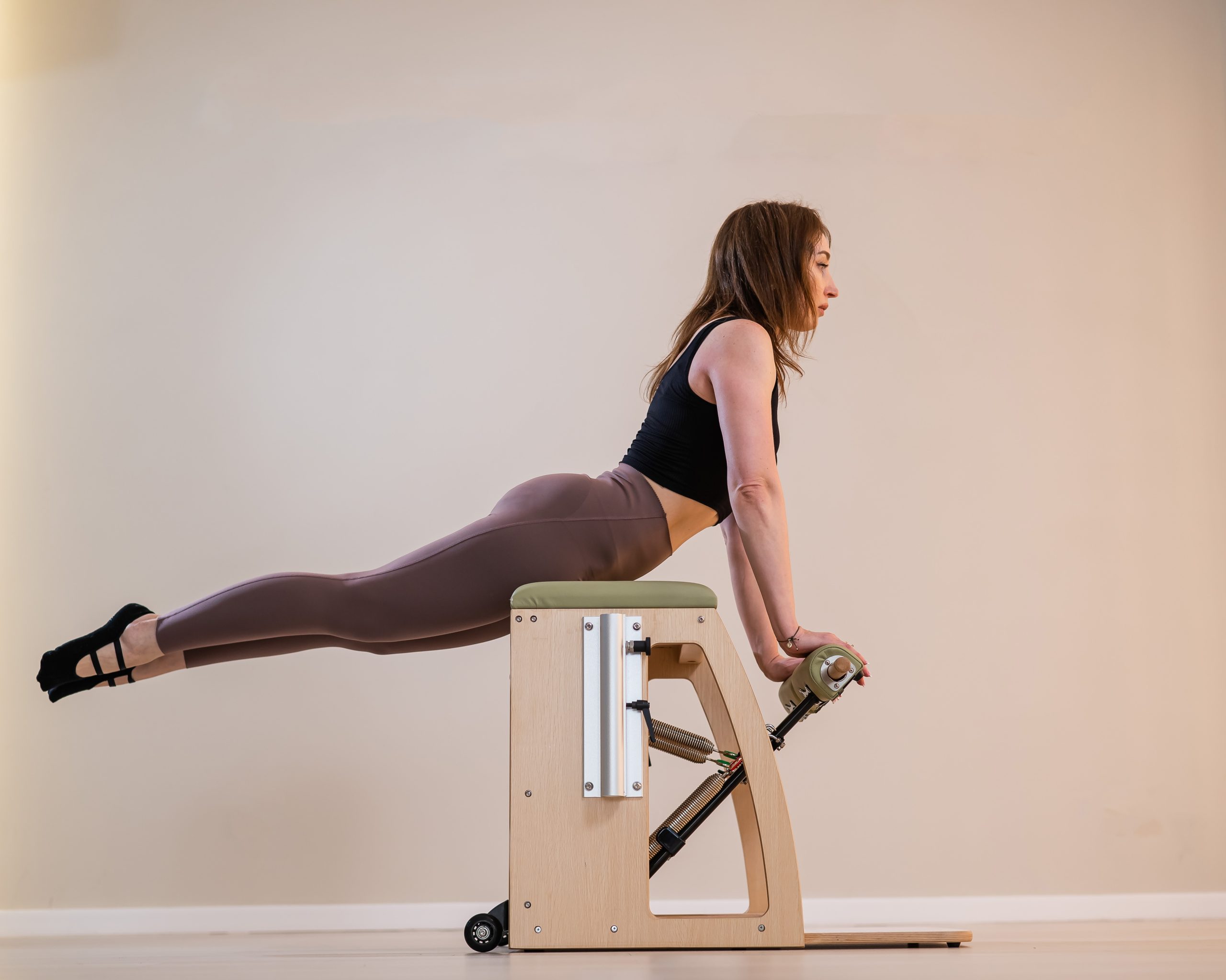 Asian,Woman,Doing,Pilates,Classic,Chair.